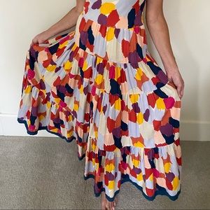 Vibrant sundress, perfect for summer outings, with tie at shoulder details.